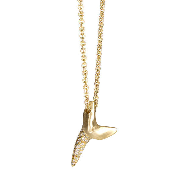 18k gold shark tooth with diamond on long chain summer jewelry by finn by candice pool neistat