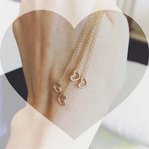 dainty mini heart 18k gold necklace on long chain by finn by candice pool neistat