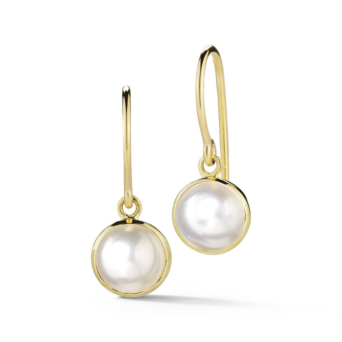 Sweet pearl drop earrings in yellow gold.